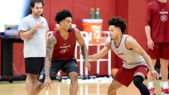 Alabama guard Aaron Estrada dribbles the ball with Alabama guard Mark Sears (1) defending during practice for the Crimson Tide Men s Basketball team Monday, Sept. 25, 2023.  